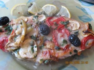 File de pangasius pe pat de legume