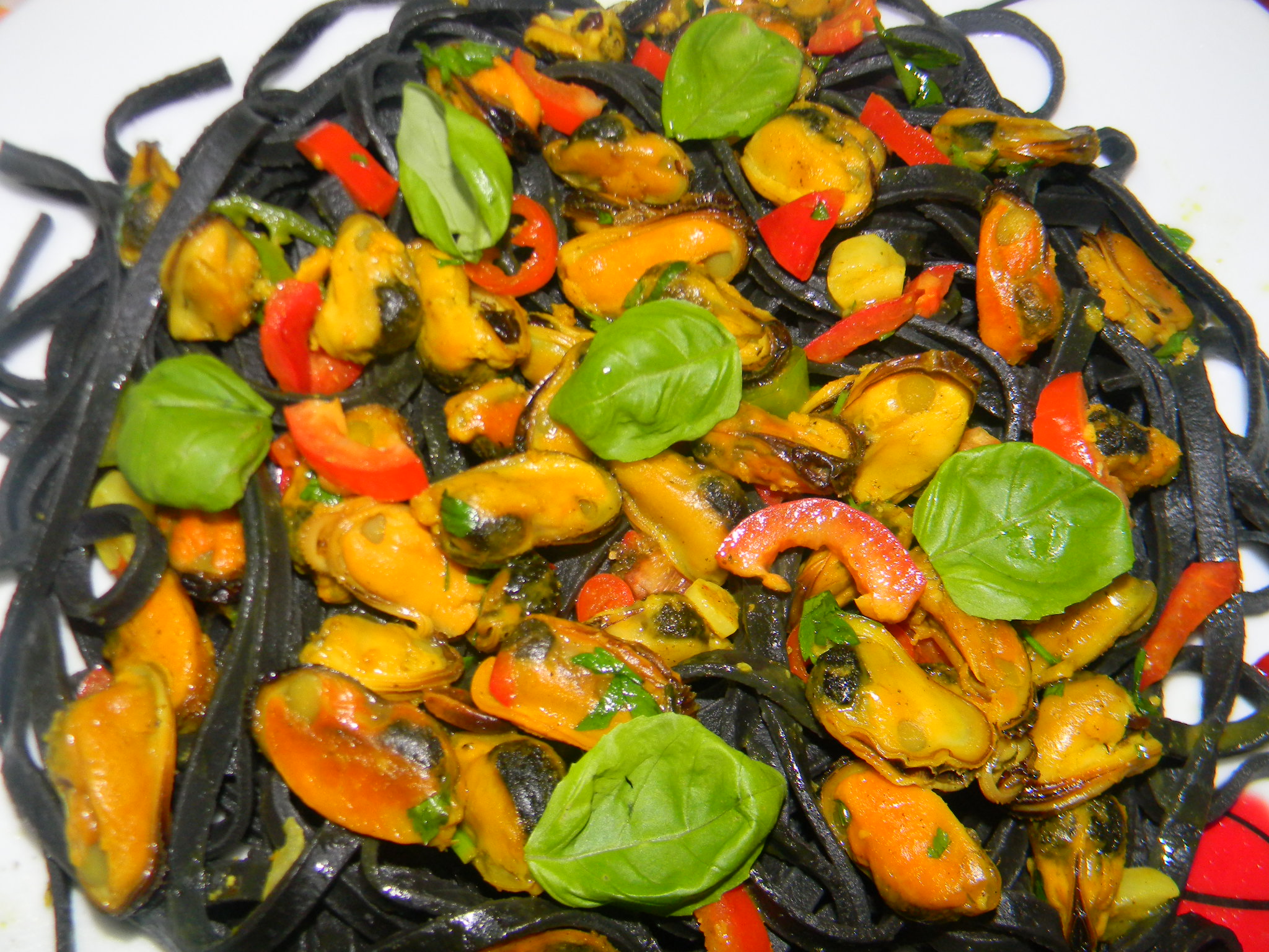 Tagliolini al nero di seppia e cozze